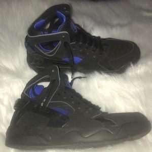 Blue and black Nike shoes